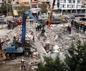 epa08030407 Search and rescue teams search for at least one person stuck in the rubble of a building after an earthquake hit Durres, Albania, 28 November 2019. Albania was hit by a 6.4 magnitude earthquake on 26 November 2019, leaving at least 41 people dead and dozens injured.  EPA/VALDRIN XHEMAJ