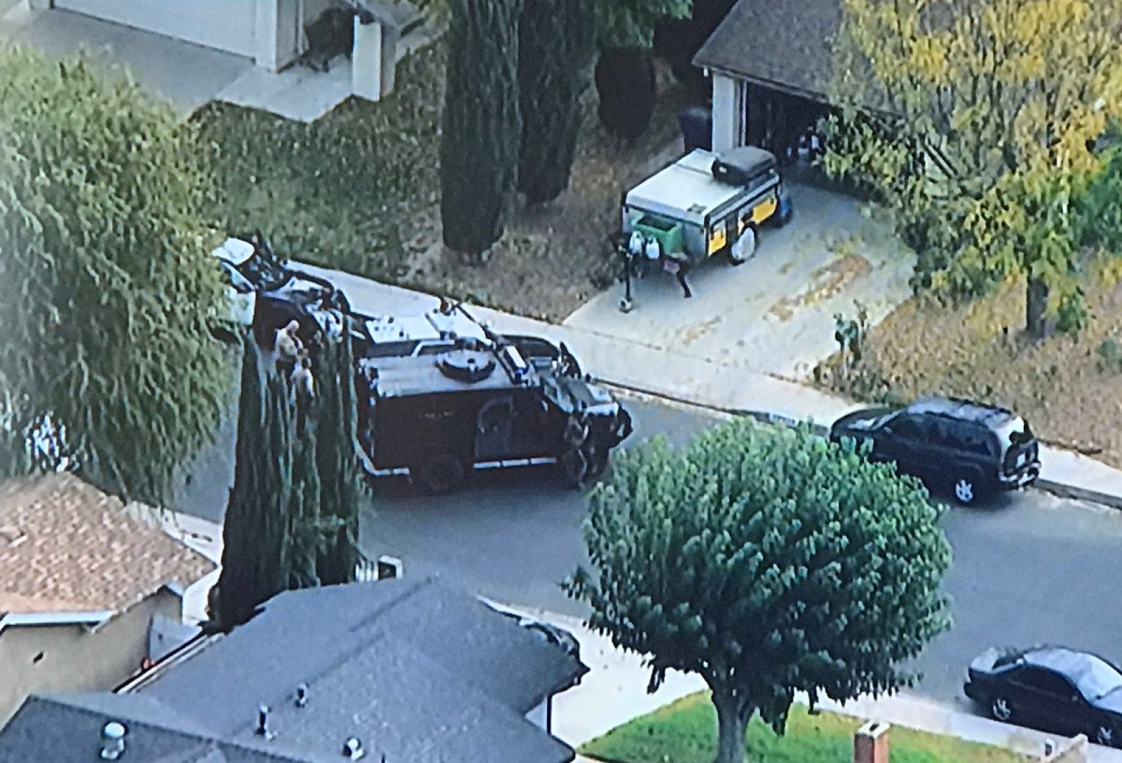 LASD SEB members arrive at nearby residence following up on leads after school shooting in Santa Clarita, California Los Angeles County Sheriff's Department (LASD) Special Enforcement Bureau (SEB) members arrive at a nearby residence, following up on leads regarding the possible suspect involved in the Saugus High School shooting in Santa Clarita, California, U.S., November 14, 2019 in this image obtained from social media. LASD SEB via REUTERS   ATTENTION EDITORS - THIS IMAGE HAS BEEN SUPPLIED BY A THIRD PARTY. MANDATORY CREDIT. NO RESALES. NO ARCHIVES. LASD SEB