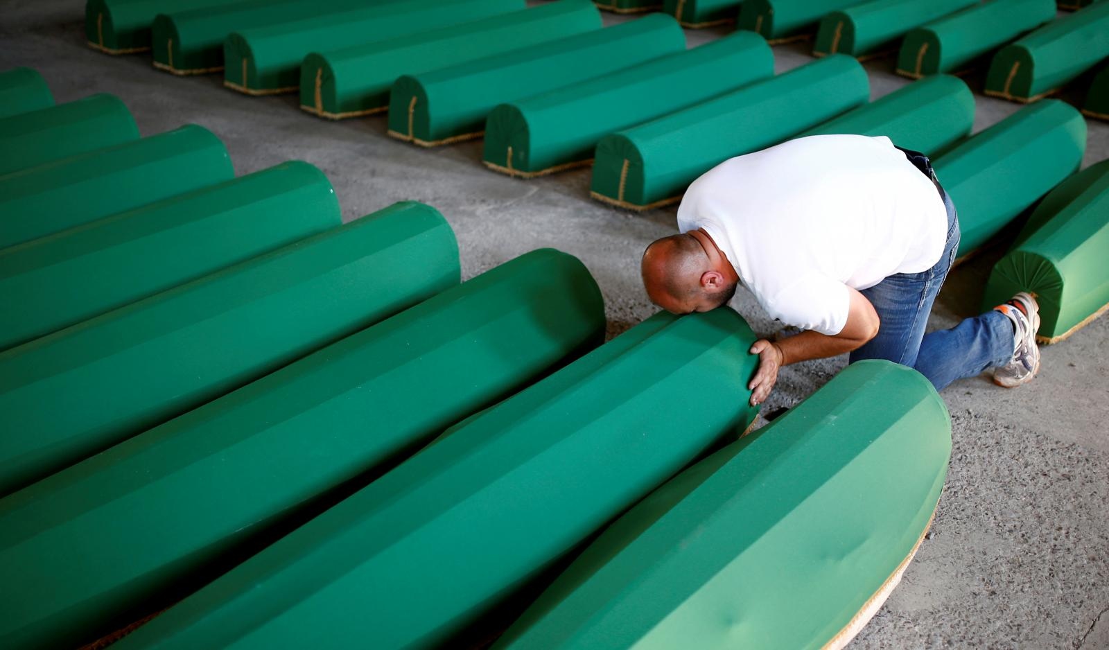 FILE PHOTO: A Muslim man cries near the coffin of his relatives, who are newly identified victims of the 1995 Srebrenica massacre and lined up for a joint burial in Potocari near Srebrenica, Bosnia and Herzegovina FILE PHOTO: A Muslim man cries near the coffin of his relatives, who are newly identified victims of the 1995 Srebrenica massacre and lined up for a joint burial in Potocari near Srebrenica, Bosnia and Herzegovina July 10, 2016. REUTERS/Dado Ruvic/File Photo Dado Ruvic
