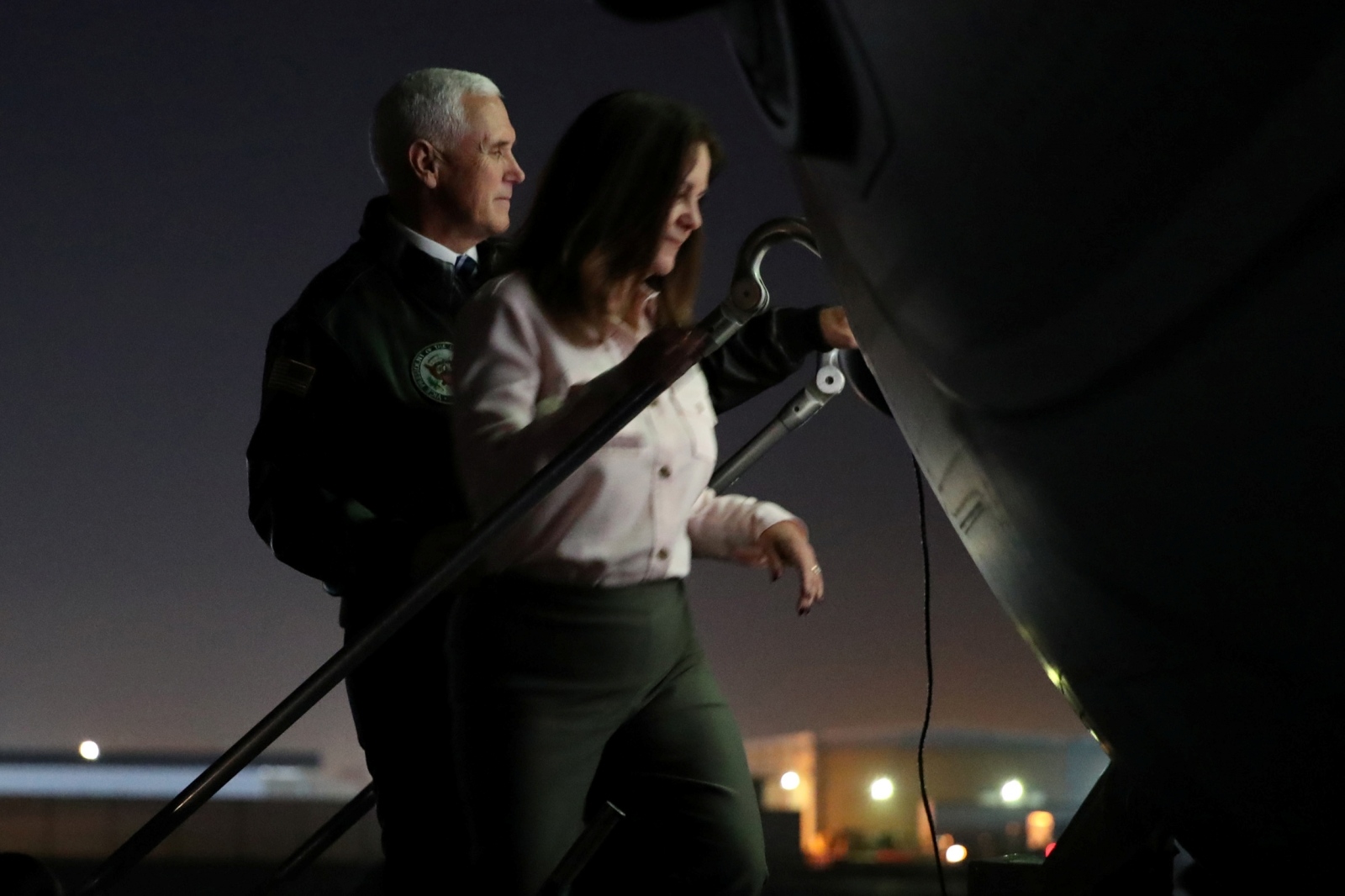 U.S. Vice President Pence and his wife board their U.S. military transport to depart Erbil International Airport in Erbil, Iraq U.S. ‪Vice President Mike Pence‬ and his wife Karen Pence board their U.S. military transport to depart Erbil International Airport in Erbil, Iraq November 23, 2019. REUTERS/Jonathan Ernst JONATHAN ERNST