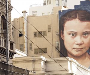 epa07991953 A mural on a side of a building depicts Swedish teenage climate activist Greta Thunberg, near Union Square in downtown San Franicsco, California, USA, 12 November 2019. The mural of Thunberg was painted by Argentinian muralist Andres Iglesias, who is also known as Cobre.  EPA/JOHN G. MABANGLO