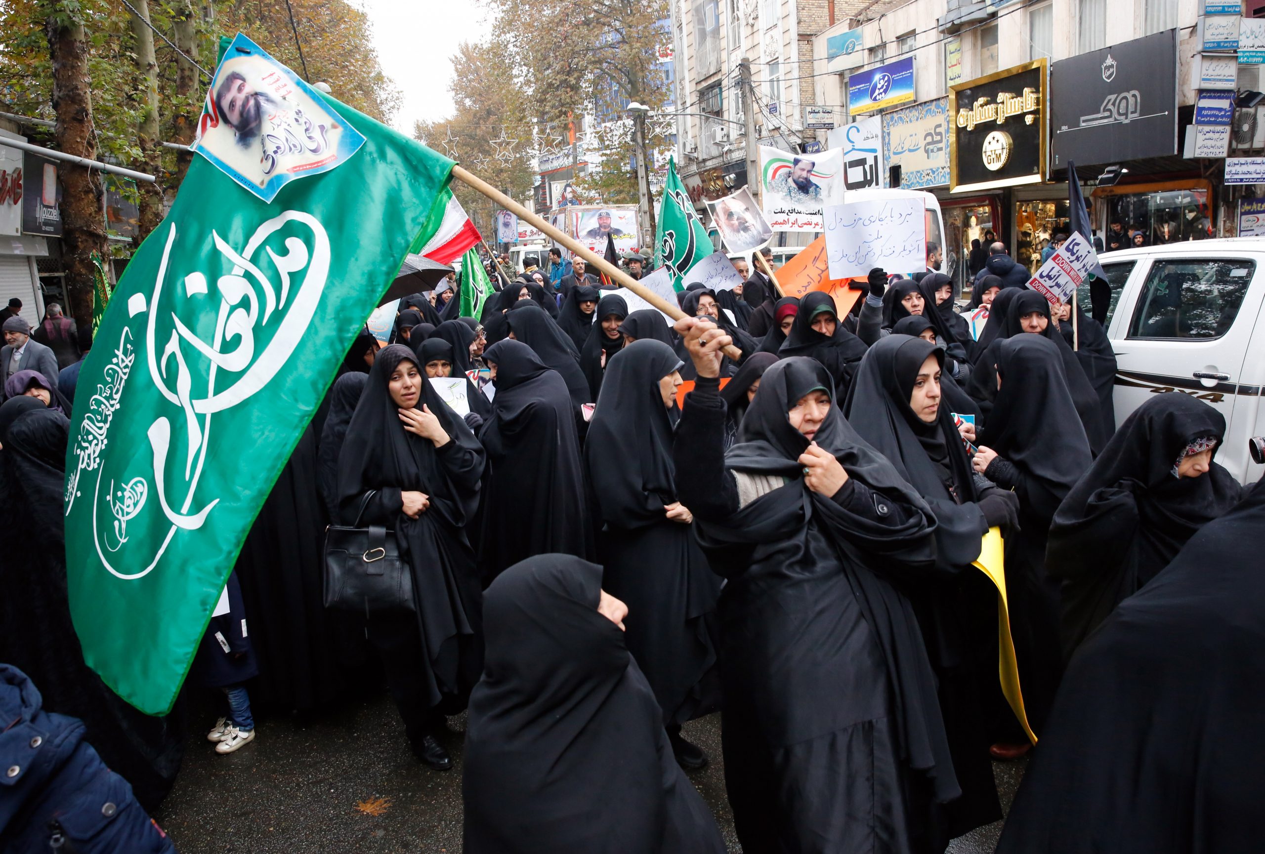 epa08010937 Iranian women take part in a funeral ceremony in the city of Shahriar, Alborz province, Iran, 20 November 2019. Ebrahimi was killed during protests over increasing fuel prices last week. Iran on 15 November increased fuel prices by at least 50 percent prompting protests in different cities.  EPA/ABEDIN TAHERKENAREH