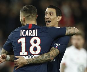 epa08017849 Paris Saint Germain's Mauro Icardi reacts with teammate Angel Di Maria (R) after scoring the 1-0 lead during the French Ligue 1 soccer match between PSG and Lille at the Parc des Princes stadium in Paris, France, 22 November 2019.  EPA/YOAN VALAT