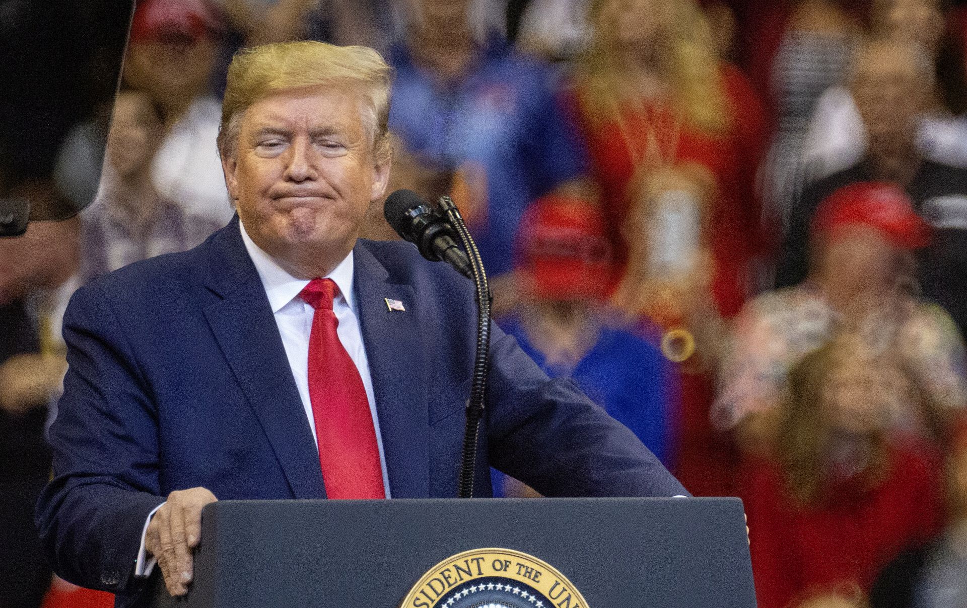 epa08028074 US President Donald J. Trump reacts during a campaign rally at the BB&T Center in Sunrise, Florida, USA, 26 November 2019.  EPA/CRISTOBAL HERRERA