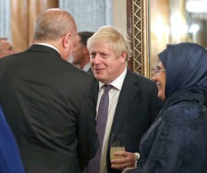 epa08042085 Britain's Prime Minister Boris Johnson (C) talks with Turkish President Recep Tayyip Erdogan (L) and his wife Emine (R) during a reception at Buckingham Palace, London, as leaders gather to mark 70 years of the alliance during the NATO Summit in London, Britain, 03 December 2019. NATO countries' heads of states and governments gather in London for a two-day meeting.  EPA/Yui Mok / POOL