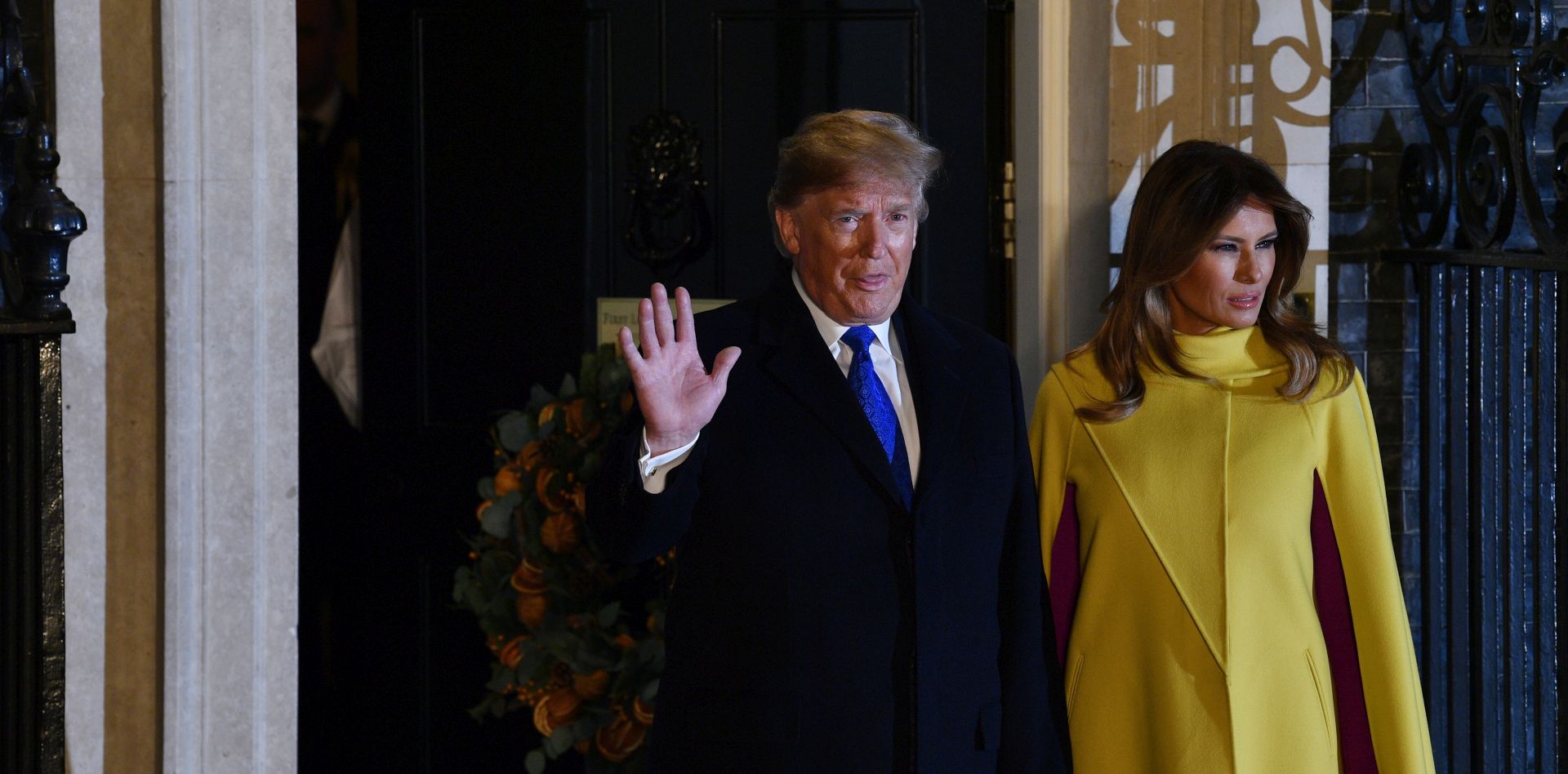 epa08042159 US President Donald J. Trump (L) and his wife Melania Trump (R) arrive at Downing Street for a reception during the NATO Summit in London, Britain, 03 December 2019. NATO countries' heads of states and governments gather in London for a two-day meeting.  EPA/NEIL HALL