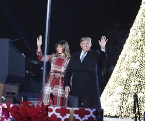 epa08047799 US President Donald J. Trump (R) and First Lady Melania Trump (L) participate in the 2019 National Christmas Tree Lighting at The Ellipse in President's Park, south of the White House in Washington, DC, USA, 05 December 2019. This is the 97th annual tree lighting ceremony.  EPA/Oliver Contreras / POOL