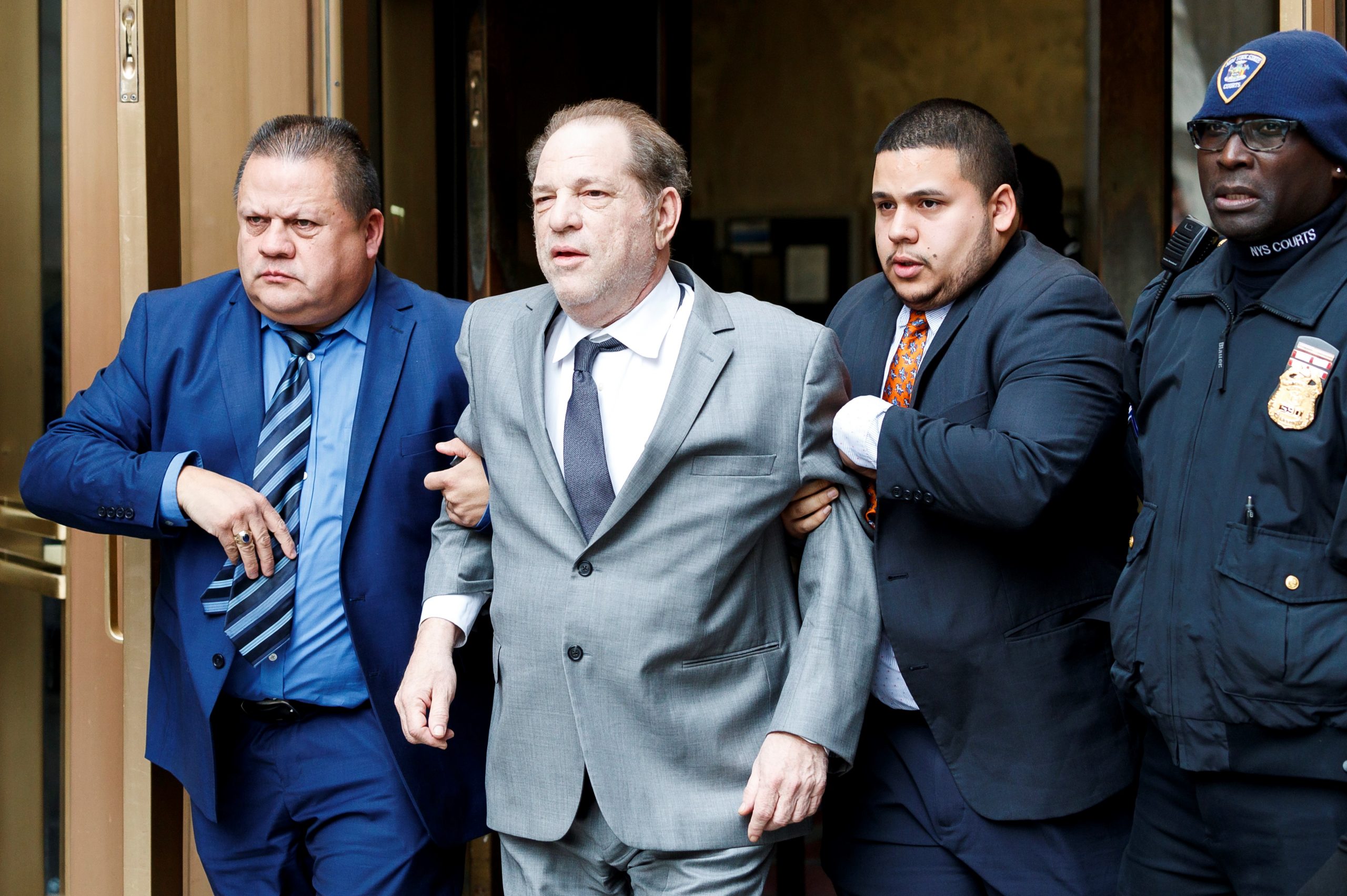 epa08049344 Former movie producer Harvey Weinstein (2-L) departs New York State Supreme Court  following a bail hearing related to his upcoming trial on charges of rape and sexual assault at in New York, New York, USA, 06 December 2019. Weinstein's trial is scheduled to start early next month.  EPA/JUSTIN LANE