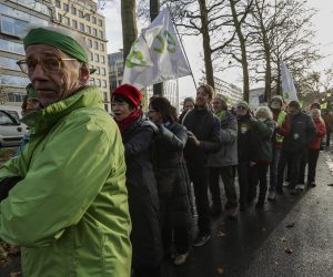 epa08054890 Environmental activists form a human chain as they take part in a rally against climate crisis, in Brussels, Belgium, 08 December 2019. The protest was held in the framework of COP25 UN Climate Change Conference running in Spanish capital until next 13 December.  EPA/OLIVIER HOSLET