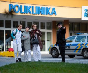 epa08058995 People are evacuated from a hospital after a shooting incident, in Ostrava, Czech Republic, 10 December 2019. According to police, at least six people have been killed in a shooting at a hospital in Ostrava. The police is looking for a suspected gunman who is at large, media reported.  EPA/LUKAS KABON