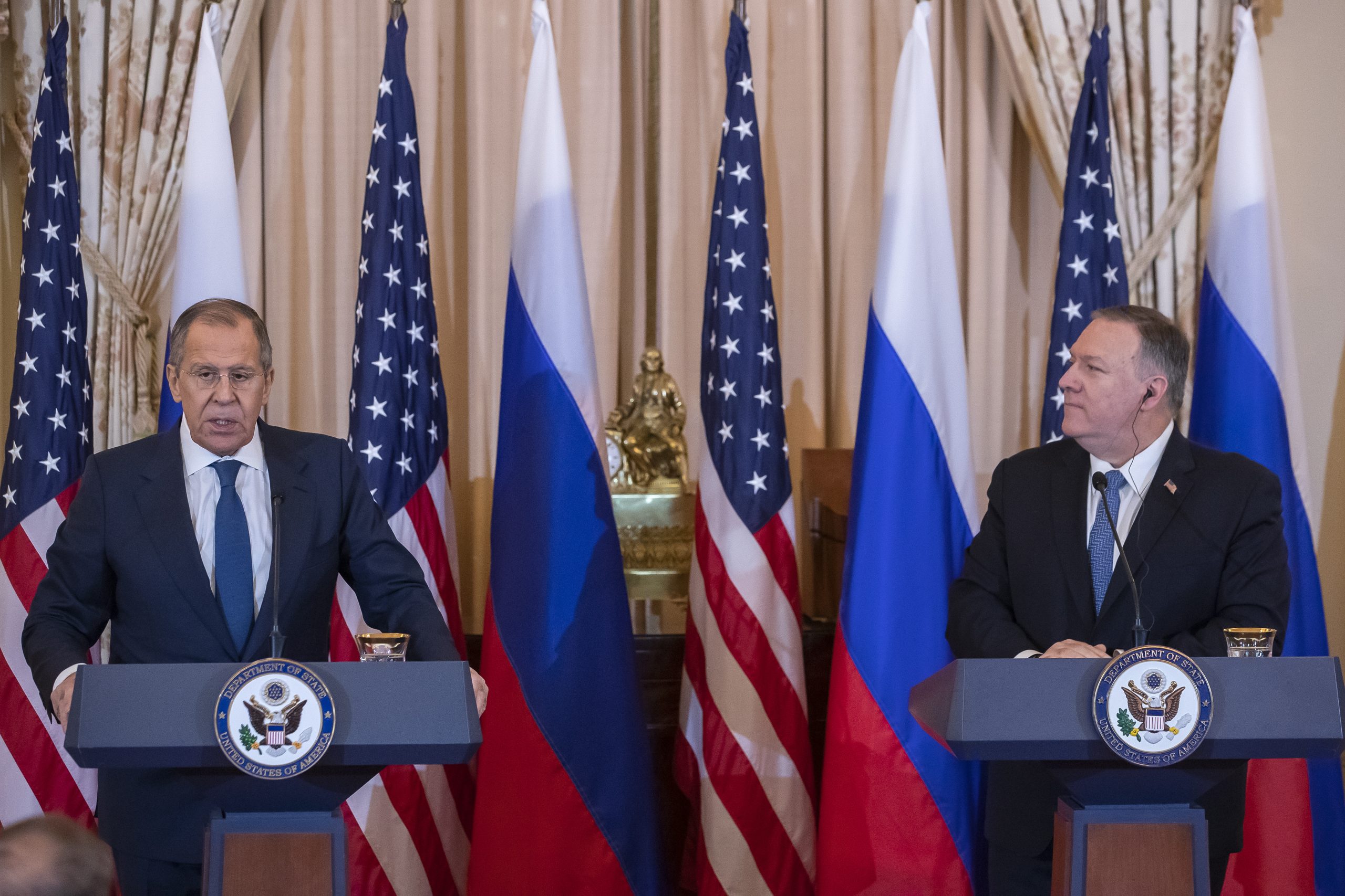 epa08060784 US Secretary of State Mike Pompeo (R) and Russian Foreign Minister Sergey Lavrov (L) participate in a press conference at the Department of State in Washington, DC, USA, 10 December 2019. Lavrov is scheduled to meet with US President Donald J. Trump at the White House later in the day.  EPA/ERIK S. LESSER