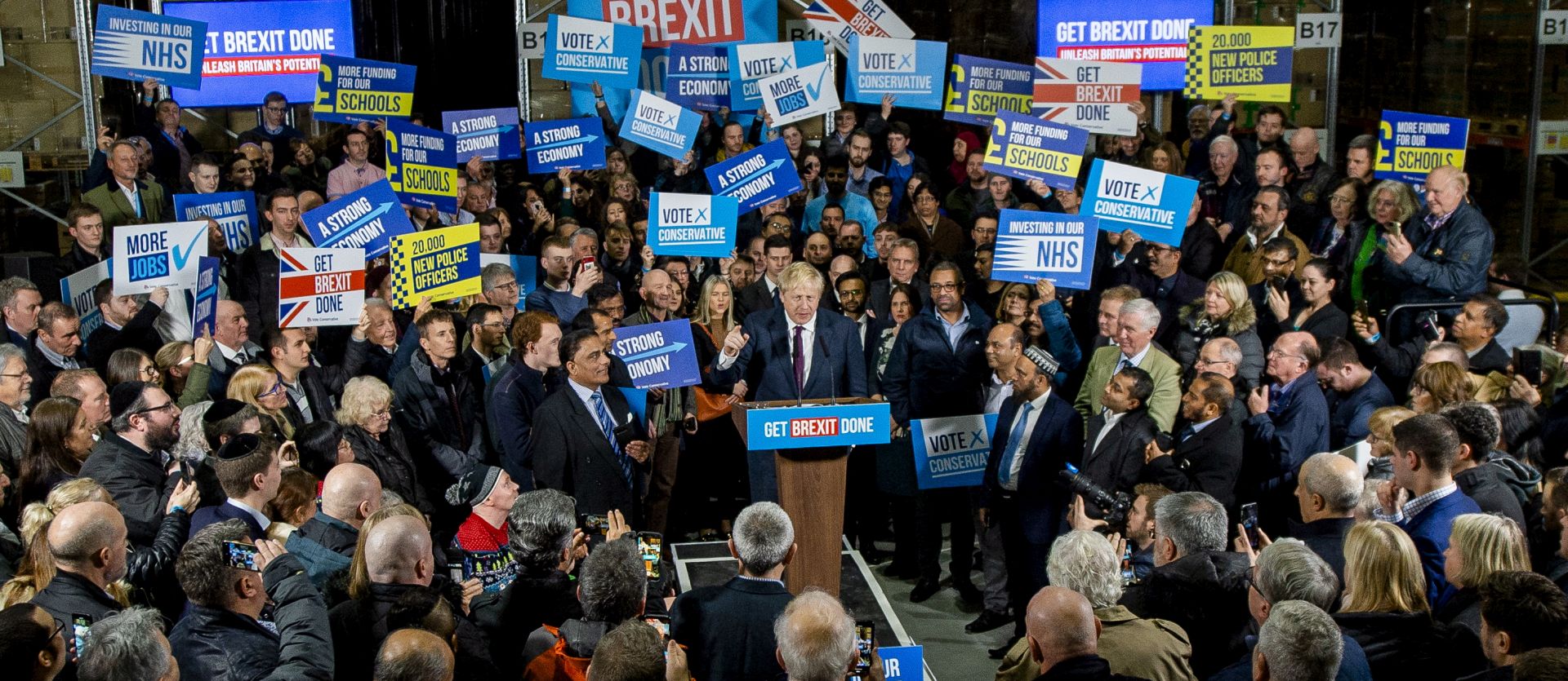 epa08061097 Prime Minister Boris Johnson delivers a speech during a visit to Globus Group, Manchester, North West, Britain, 10 December 2019. Britons go to the polls on 10 December in a general election  EPA/PETER POWELL .