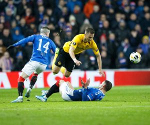 epa08066741 Ryan Kent of Rangers (L), Young Boys Nicolas Buergy (C) and Borna Barisic of Rangers (R) in action during the UEFA Europa League match Rangers v BSC Young Boys in Glasgow, Britain, 12 December 2019.  EPA/ROBERT PERRY