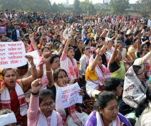 epa08081361 Artists from Assam along with citizens shout slogans as they take part in a demonstration demanding withdrawal of the Citizenship Amendment Act 2019 (CAA) in Guwahati, India, 19 December 2019. The CAA will give Indian citizenship rights to refugees from Hindu, Jain, Buddhist, Sikhs, Parsi or Christian communities coming from Afghanistan, Bangladesh and Pakistan.  EPA/STR