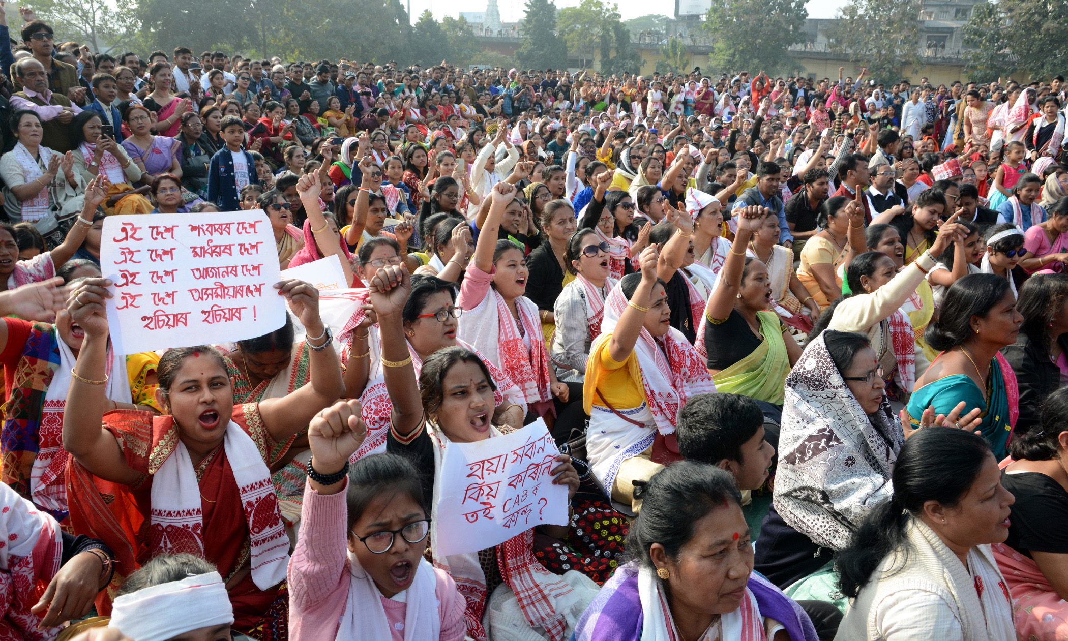 epa08081361 Artists from Assam along with citizens shout slogans as they take part in a demonstration demanding withdrawal of the Citizenship Amendment Act 2019 (CAA) in Guwahati, India, 19 December 2019. The CAA will give Indian citizenship rights to refugees from Hindu, Jain, Buddhist, Sikhs, Parsi or Christian communities coming from Afghanistan, Bangladesh and Pakistan.  EPA/STR
