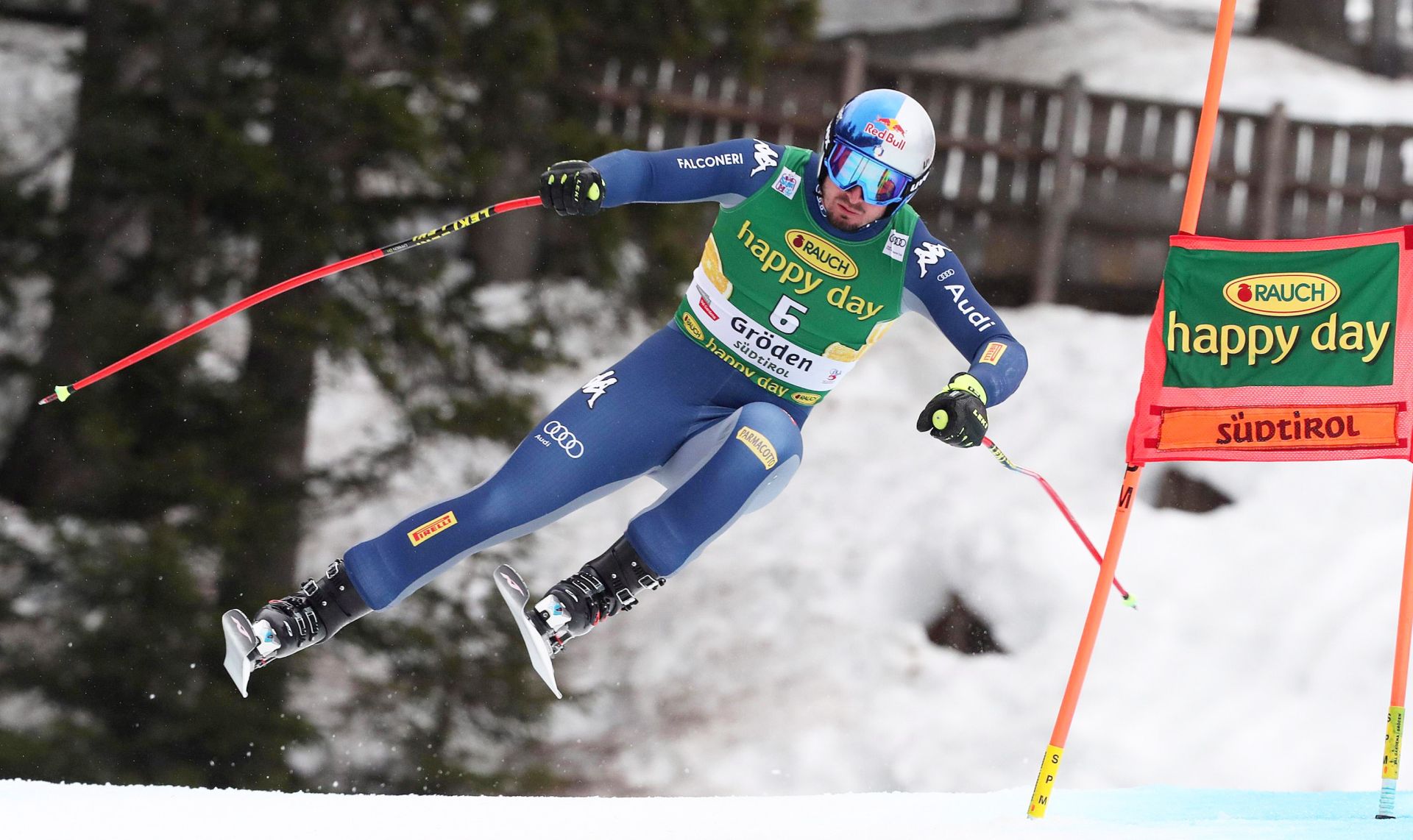epa08083757 Dominik Paris of Italy speeds down the slope during the Men's Super-G race at the FIS Alpine Skiing World Cup event in Val Gardena, Italy, 20 December 2019.  EPA/ANDREA SOLERO