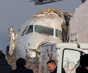 epa08091526 Rescuers work at the site of an airplane crash near Almaty airport, some 20km from the city of Almaty, Kazakhstan, 27 December 2019. According to media reports, at least 14 people have died and over 60 were injured after a Bek Air's Fokker 100 passenger plane with around 100 people on board crashed shortly after taking off from Almaty airport. The flight was en-route from Almaty, the country's largest city, to the capital Nur-Sultan. The cause of the incident is yet unknown.  EPA/VLADIMIR ZAIKIN
