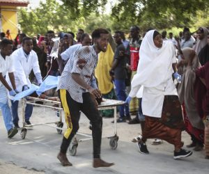 epa08092312 A wounded person is carried on a stretcher at Medina hospital in Mogadishu, Somalia, 28 December 2019. According reports, a large explosion rocked the area near Ex-control Afgoye. Initial police reports said at least five people were killed in what is believed to have been a car bombing.  EPA/SAID YUSUF WARSAME