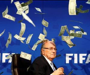 Pictures of the Decade British comedian known as Lee Nelson (unseen) throws banknotes at FIFA President Sepp Blatter as he arrives for a news conference after the Extraordinary FIFA Executive Committee Meeting at the FIFA headquarters in Zurich, Switzerland, July 20, 2015. Picture taken July 20, 2015. REUTERS/Arnd Wiegmann/File Photo   SEARCH "POY DECADE" FOR THIS STORY. SEARCH "REUTERS POY" FOR ALL BEST OF 2019 PACKAGES. TPX IMAGES OF THE DAY. ARND WIEGMANN