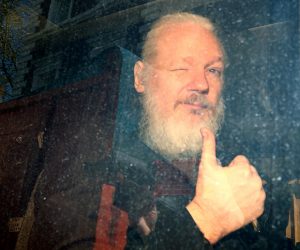 FILE PHOTO: Pictures of the Year: A Picture and its Story FILE PHOTO: WikiLeaks founder Julian Assange arrives at the Westminster Magistrates Court, after he was arrested  in London, Britain, April 11, 2019. Reuters Photographer Hannah McKay:/File Photo Hannah Mckay