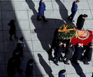 Exhumation of late Spanish dictator Francisco Franco in Spain Franco's relatives carry his coffin out of the Basilica of The Valle de los Caidos (The Valley of the Fallen) in San Lorenzo de El Escorial, Spain, October 24, 2019. Emilio Naranjo/Pool via REUTERS POOL