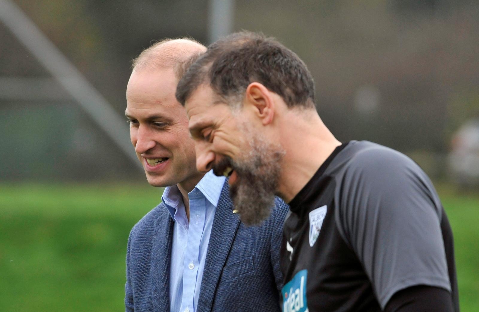 Britain's Prince William meets soccer players in Walsall Britain's Prince William meets soccer coach Slaven Bilic during a visit to West Bromwich Albion Training Ground as part of the Heads Up campaign in Walsall, Britain November 28, 2019. Rui Vieira/Pool via REUTERS POOL
