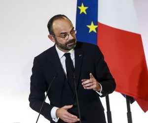 epa08063121 French Prime Minister Edouard Philippe delivers his speech to unveil the details of a pension reform plan before the CESE (Economic, Social and Environmental Council) in Paris, France, 11 December 2019. Unions representing railway and transport workers and many others in the public sector have called for a 6th day of general strike and demonstration to protest against French government's reform of the pension system.  EPA/CHRISTOPHE PETIT TESSON