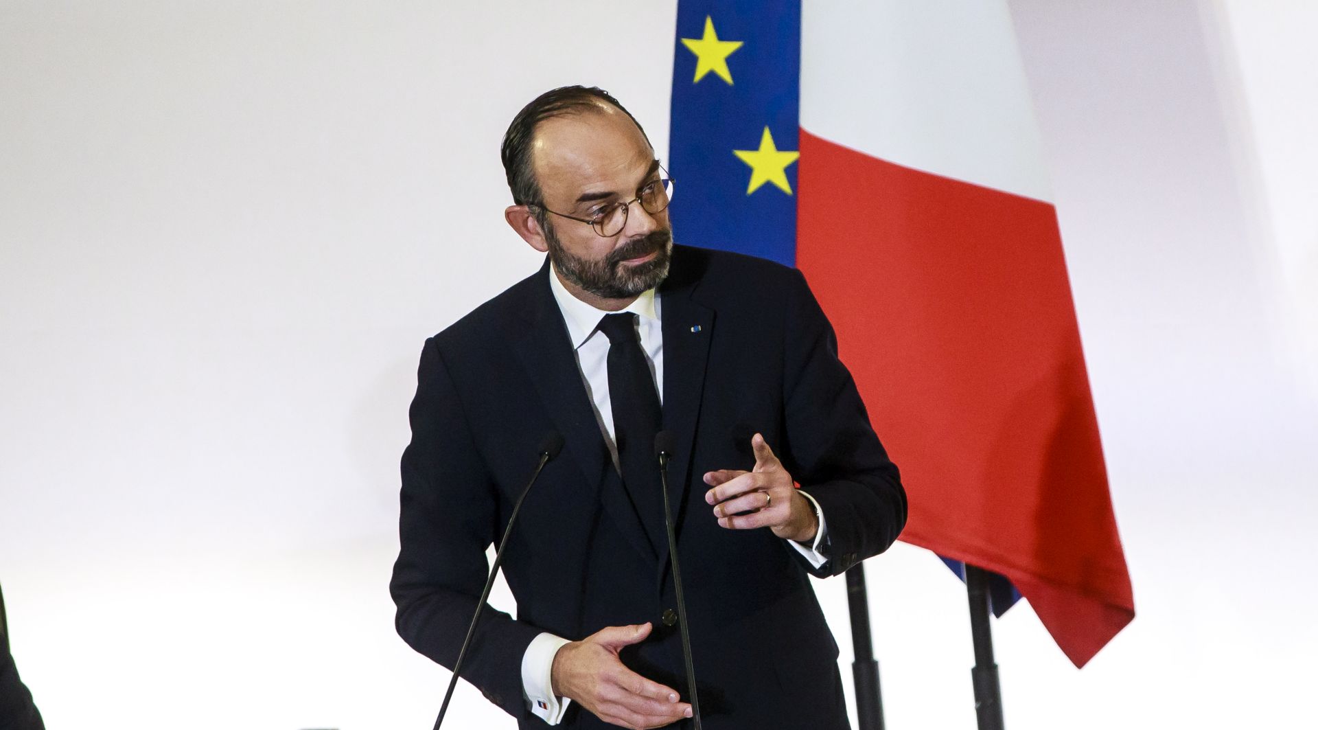 epa08063121 French Prime Minister Edouard Philippe delivers his speech to unveil the details of a pension reform plan before the CESE (Economic, Social and Environmental Council) in Paris, France, 11 December 2019. Unions representing railway and transport workers and many others in the public sector have called for a 6th day of general strike and demonstration to protest against French government's reform of the pension system.  EPA/CHRISTOPHE PETIT TESSON