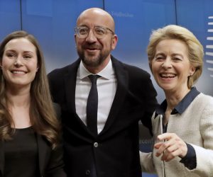 epa08068676 (L-R) Finnish Prime Minister Sanna Marin, European Council President Charles Michel and European Commission President Ursula Von der Leyen pose for a photograph during the final press conference on the second day of the European Council summit in Brussels, Belgium, 13 December 2019. Finland is currently holding the EU's rotating presidency until the end of the year. EU leaders gathered in Brussels on 12 and 13 December to discuss climate change, the EU's long-term budget and external relations, the economic and monetary union and Brexit, among other issues.  EPA/OLIVIER HOSLET