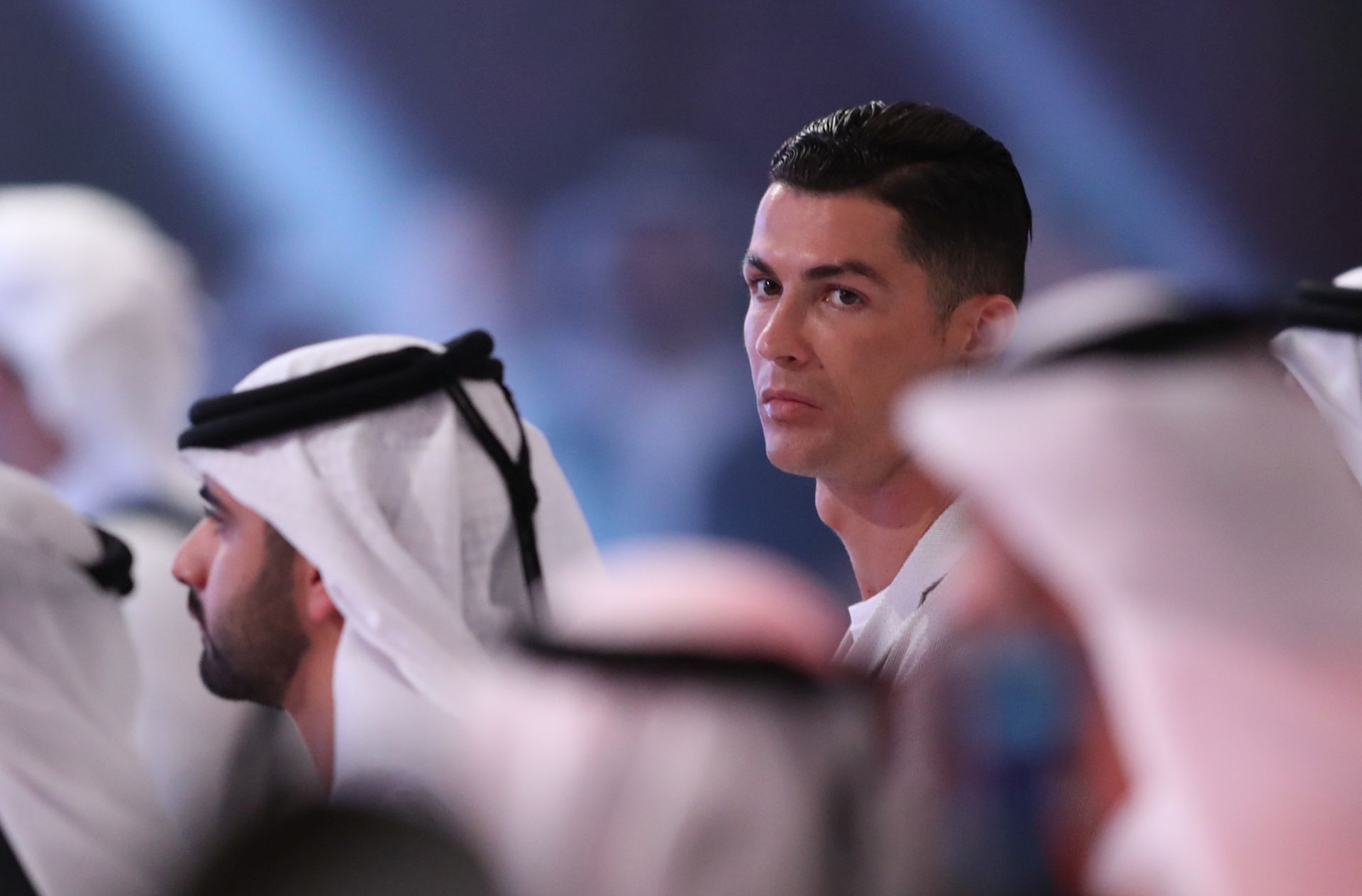 epa08092365 Cristiano Ronaldo (R), Portuguese National Team and Italy's Juventus FC player attends the first day of the Dubai International Sports Conference in Dubai, United Arab Emirates, 28 December 2019. This year is the 14th Dubai International Sports Conference.  EPA/ALI HAIDER