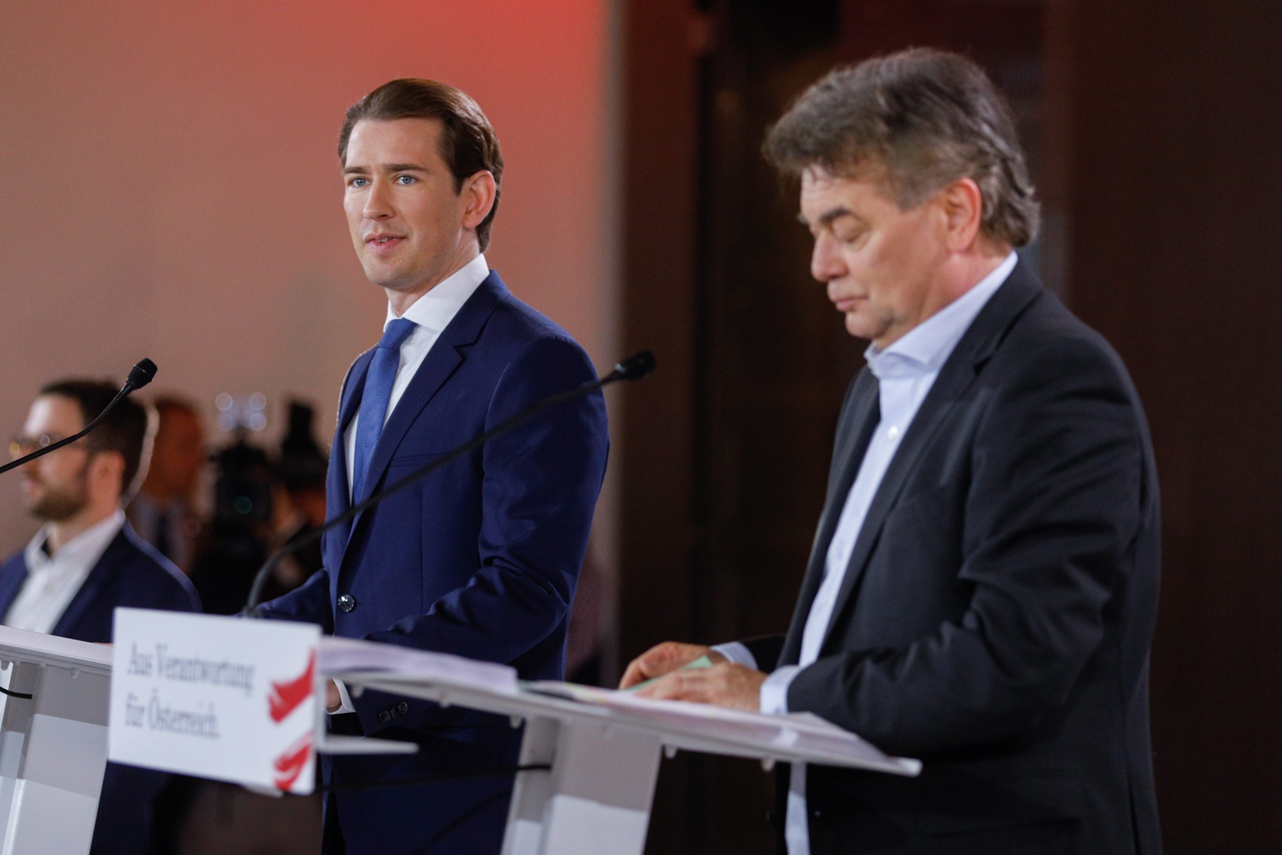 epa08098724 Leader of Austrian People's Party (OeVP), Sebastian Kurz (L), and Leader of the Austrian Green Party, Werner Kogler, during a press conference to present the government program in Vienna, Austria, 02 January 2020. Kurz and Kogler agreed on a coalition of the OeVP and the Green Party to form a new government on 01 January 2020.  EPA/FLORIAN WIESER