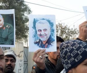 epa08100299 Pakistani Shi'ite Muslims hold pictures of General Qasem Soleimani, the head of Iran's Islamic Revolutionary Guard Corps' elite Quds Force, during a protest against the USA, in Peshawar, Pakistan, 03 January 2020. General Qasem Soleimani, was killed in an airstrike on 03 January, in Baghdad ordered by the United States president, the Pentagon said. General Soleimani was in charge of Iran's foreign policy strategy as the head of the Quds Force, an elite wing of the Islamic Revolutionary Guard Corps, which the US designated as a terror organization. The Quds Force holds sway over a raft of Shia militias across the region, from Lebanon to Syria and Iraq.  EPA/SOHAIL SHAHZAD