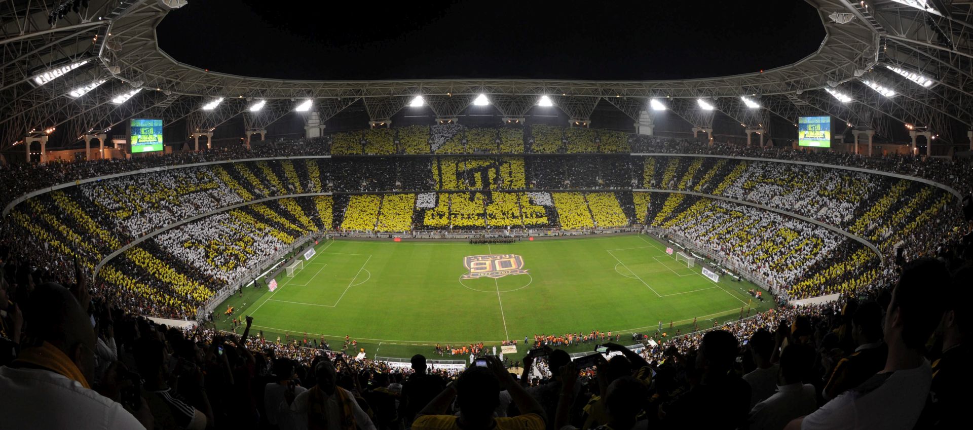 epa08108045 (FILE) - Al-Ittihad fans fill the stadium before a friendly soccer match between Al-Ittihad and Atletico Madrid at King Abdullah Sports City stadium, nicknamed al-Jawhra (the Jewel), Jeddah, Saudi Arabia, 30 December 2016 (re-issued 06 January 2020). The Spanish Super Cup 2019-20 (Supercopa de Espana) will be held at the stadium over two semi finals on 08 and 09 January 2020 and the final on 12 January 2020. The four teams taking part are Valencia, Barcelona, Real Madrid and Atletico Madrid.  EPA/STR *** Local Caption *** 53189586