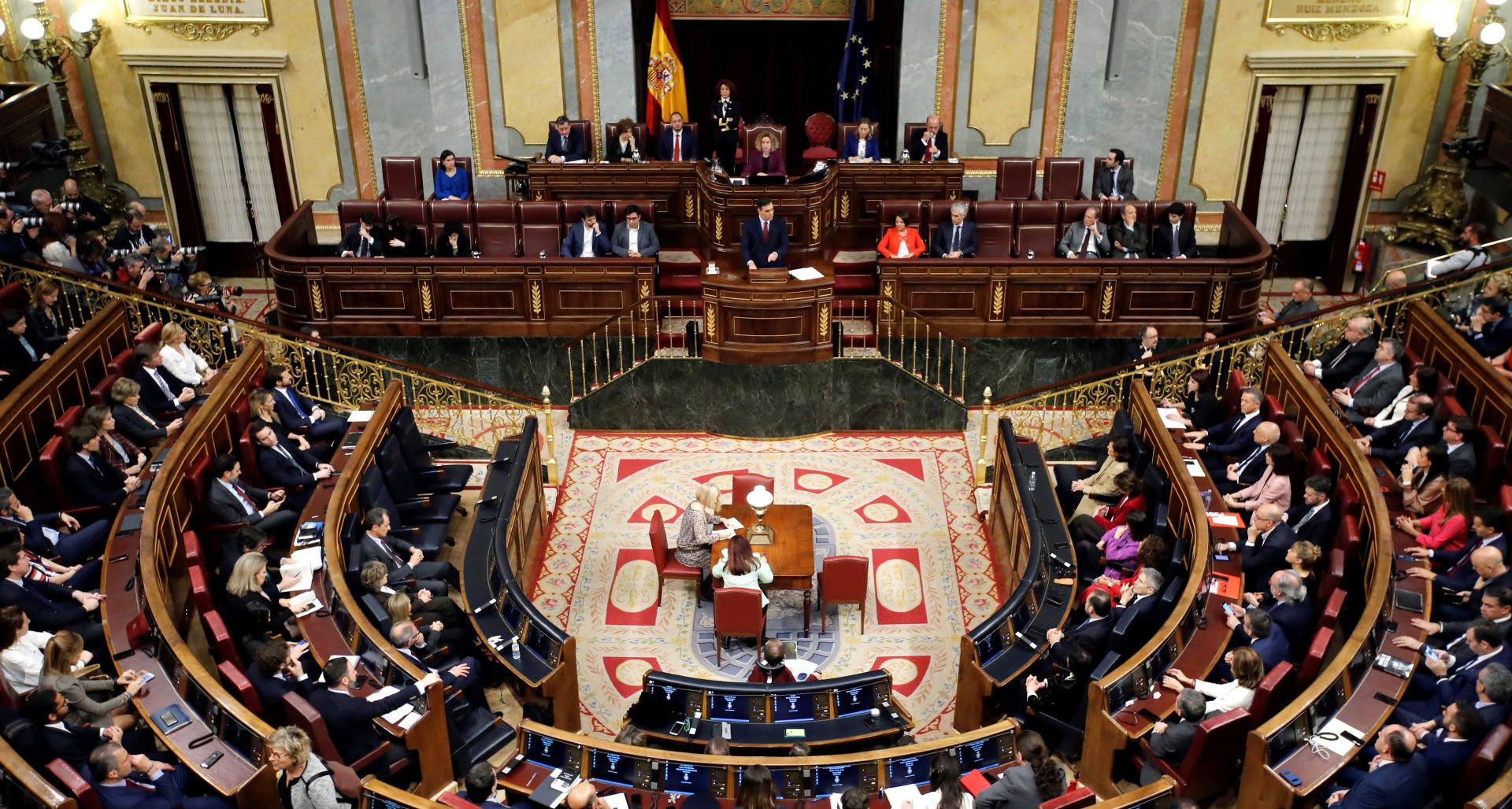 epa08109956 Spanish acting Prime Minister Pedro Sanchez delivers his speech at the start of the second investiture voting at the Lower House in Madrid, Spain, 07 January 2020. The Spanish Parliament holds the second investiture voting at Parliament in which acting Prime Minister Pedro Sanchez is expected to win by a tight majority.  EPA/Juan Carlos Hidalgo / POOL