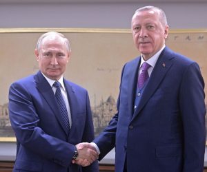 epa08112213 Russian President Vladimir Putin (L) shakes hands with Turkish President Recep Tayyip Erdogan during their meeting in Istanbul, Turkey, 08 January 2020.