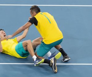 epa08113710 Alex De Minaur (L) and Nick Kyrgios (R) of Australia celebrate winning the doubles match against Jamie Murray and Joe Salisbury of Great Britain during the quarter final on day seven of the ATP Cup tennis tournament at Ken Rosewall Arena in Sydney, Australia, 09 January 2020.  EPA/CRAIG GOLDING EDITORIAL USE ONLY AUSTRALIA AND NEW ZEALAND OUT