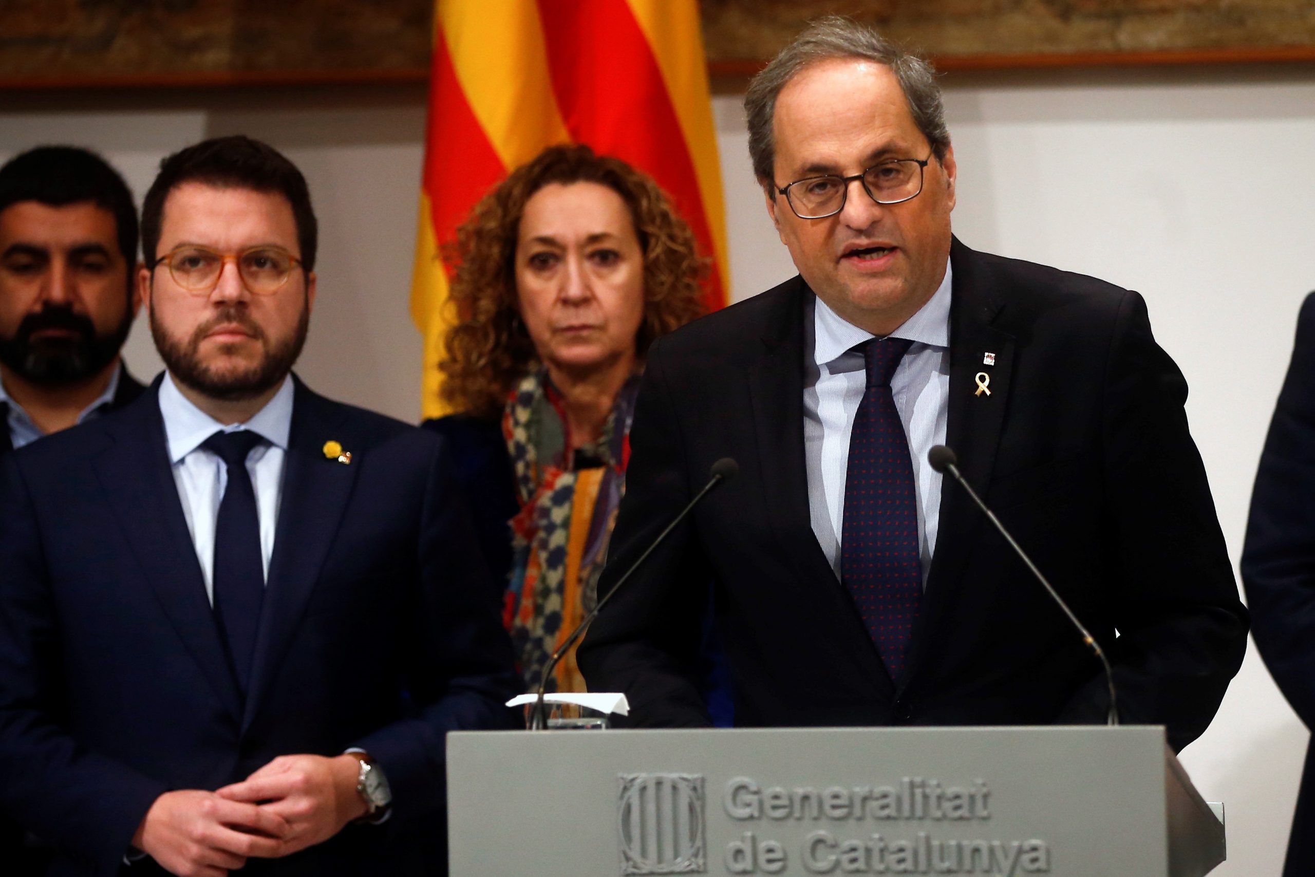 epa08116853 Catalan regional President, Quim Torra (R), and Vice President, Pere Aragones (L), address a press conference in Barcelona, Spain, 10 January 2020, to announce he 'does not recognize the effects' of the Supreme's Court announcement. The Supreme Court has denied Torra's petition to urgently suspend the decision made by the Spanish Electoral Commission, last 03 January 2020, of withdrawing Torra's MP certificate after last 19 December 2019, the Catalan Superior Court of Justice sentenced Torra to be suspended for 18 months after he refused to withdraw pro-independence symbols from public buildings during the electoral period.  EPA/Quique García