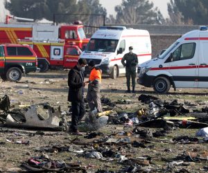 epa08118607 (FILE) - Officials inspect the wreckage after a Ukraine International Airlines Boeing 737-800 carrying 176 people crashed near Imam Khomeini Airport in Tehran, killing everyone on board, in Shahriar, Iran, 08 January 2020 (reissued 11 January 2020). According to media reports, the Iranian military released a statement on 11 January claiming that Ukraine International Airlines flight 752 was shot down due to a human error.  EPA/ABEDIN TAHERKENAREH