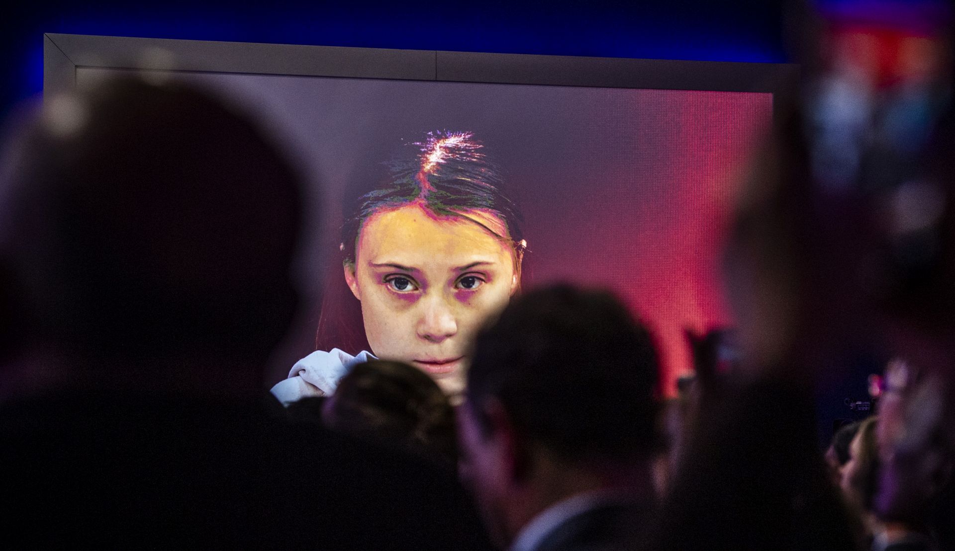 epa08146520 Swedish climate activist Greta Thunberg is displayed on a large screen as she attends a panel session during the 50th annual meeting of the World Economic Forum (WEF) in Davos, Switzerland, 21 January 2020. The meeting brings together entrepreneurs, scientists, corporate and political leaders in Davos under the topic 'Stakeholders for a Cohesive and Sustainable World' from 21 to 24 January 2020.  EPA/GIAN EHRENZELLER