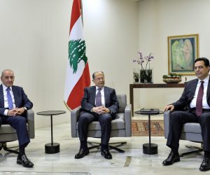 epa08148640 President Michel Aoun (C) meets with Prime Minister-designate Hassan Diab (R) and Lebanese Parliament Speaker Nabih Berri (L) at the presidential palace in Baabda, east of Beirut, Lebanon 21 January 2020. According to local media, the three leaders met after the Prime Minister-designate presented the formation of the new government from 20 Ministers, after about 40 days of consultations with the Lebanese parties, and ended up forming a government representing the 08 March group, Hezbollah, the Amal Movement, the Free Patriotic Movement, the President of the Republic, and some loyal to them, and the anti-government protestors refused the new government, and started closing the roads in all Lebanon.  EPA/WAEL HAMZEH