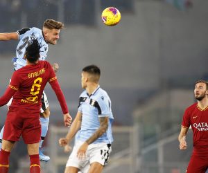 epa08167594 Lazio's Sergej Milinkovic-Savic (back L) in action against Roma's Chris Smalling (front L) during the Italian Serie A soccer match between AS Roma and SS Lazio at Olimpico stadium in Rome, Italy, 26 January 2020.  EPA/RICCARDO ANTIMIANI