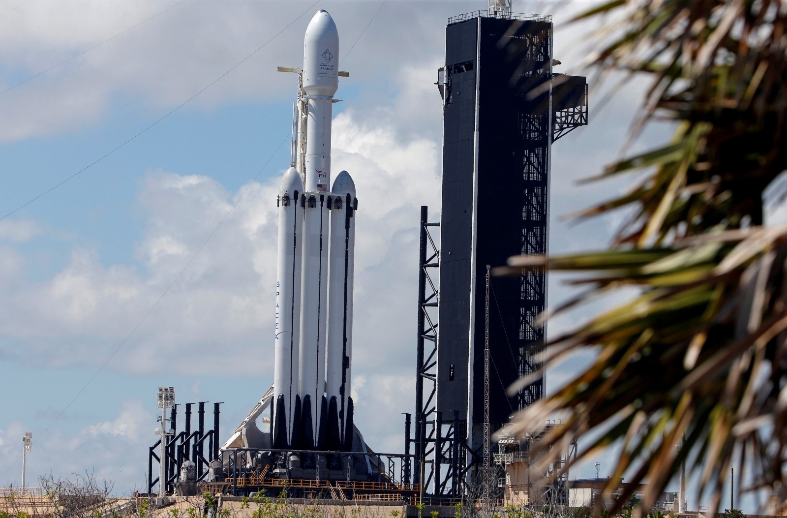 FILE PHOTO: A SpaceX Falcon Heavy rocket with the Arabsat 6A communications satellite aboard is prepared for launch at the Kennedy Space Center in Cape Canaveral FILE PHOTO: A SpaceX Falcon Heavy rocket with the Arabsat 6A communications satellite aboard is shown before another launch attempt at the Kennedy Space Center in Cape Canaveral, Florida, U.S., April 11, 2019.  REUTERS/Joe Skipper/File Photo Joe Skipper