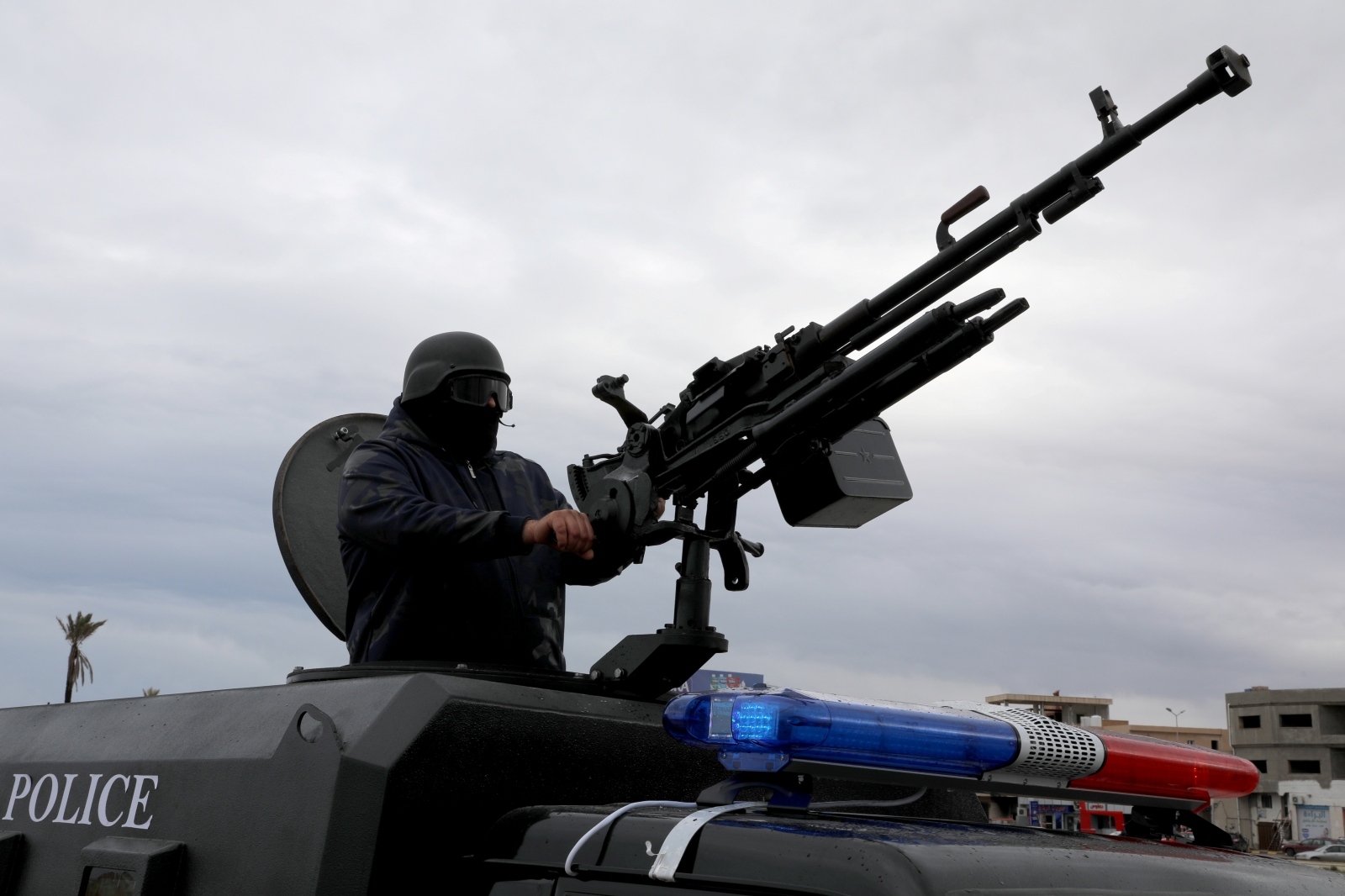 A member of the central security support force holds a weapon during the security deployment in the Tajura neighborhood, east of Tripoli A member of the central security support force holds a weapon during the security deployment in the Tajura neighborhood, east of Tripoli, Libya December 30, 2019.  REUTERS/Ismail Zitouny ISMAIL ZITOUNY