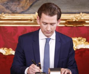 epa08109770 Leader of Austrian People's Party (OeVP)
Sebastian Kurz signs the paperwork during the swearing-in of the new coalition government between Austrian Peoples Party (OeVP) and the Green Party at the presidential office of the Hofburg Palace in Vienna, Austria, 07 January 2020. The OeVP and Green parties have formed the new coalition government after holding coalition negotiations talks after the general elections in September 2019.  EPA/FLORIAN WIESER
