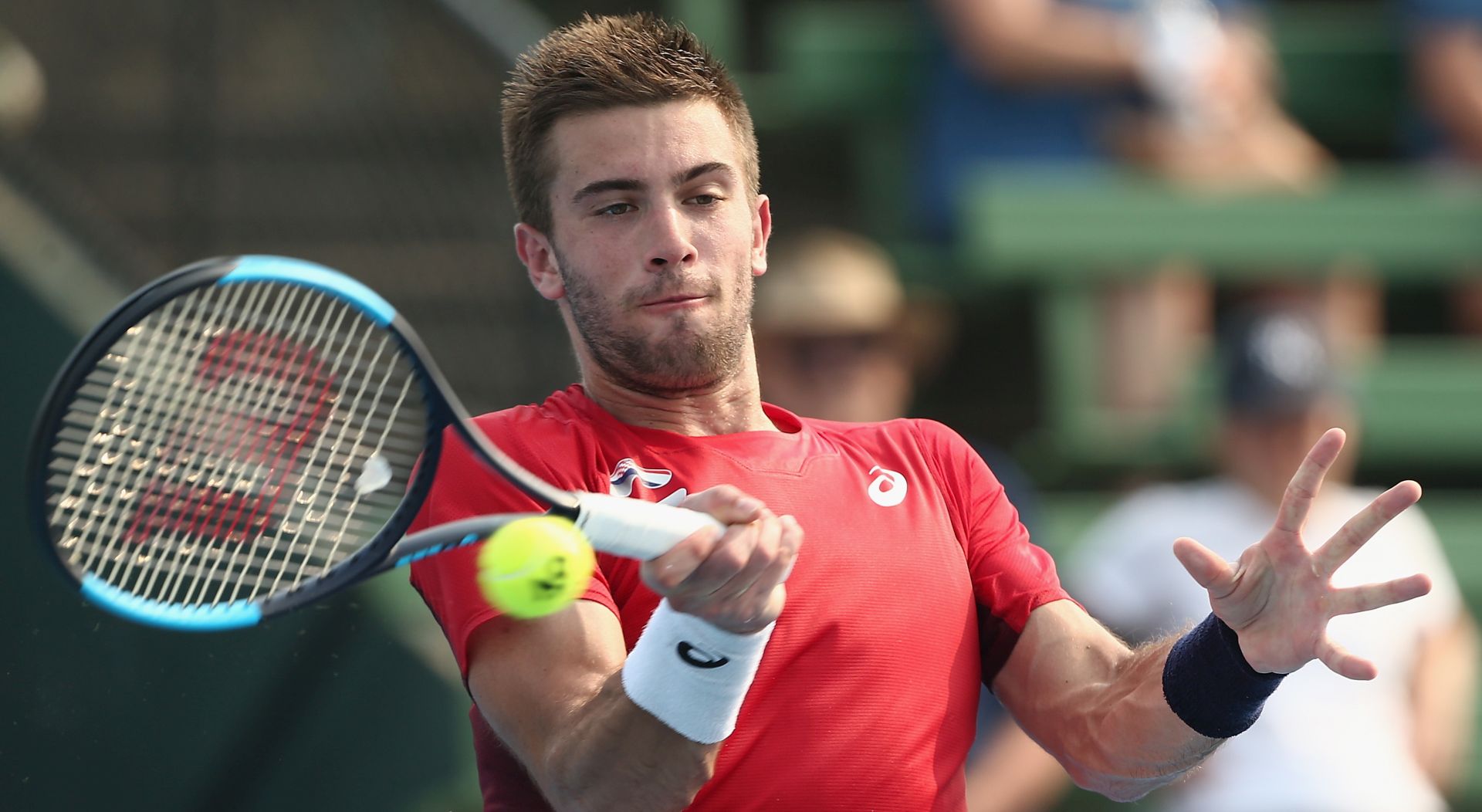epa08126362 Borna Coric of Croatia in action against Grigor Dimitrov of Bulgaria during the Kooyong Classic at Kooyong Lawn Tennis Club in Melbourne, Australia, 14 January 2020.  EPA/ROB PREZIOSO AUSTRALIA AND NEW ZEALAND OUT  EDITORIAL USE ONLY