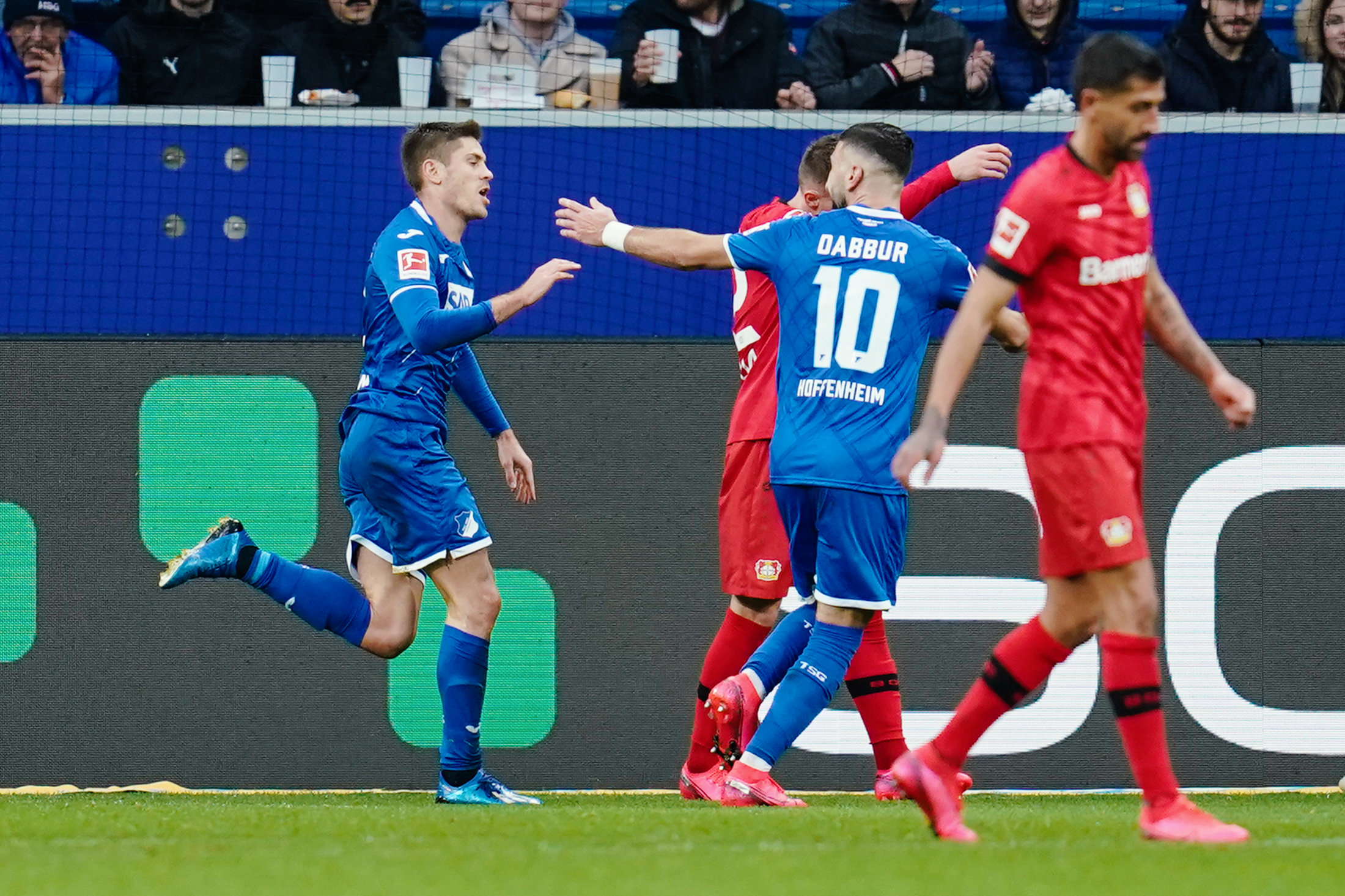 01 February 2020, Baden-Wuerttemberg, Sinsheim: Hoffenheim's Andrej Kramaric (L) celebrates scoring his side's first goal with team mate Munas Dabbur during the German Bundesliga soccer match between TSG 1899 Hoffenheim and Bayer 04 Leverkusen at Rhein-Neckar-Arena. Photo: Uwe Anspach/dpa - IMPORTANT NOTICE: DFL and DFB regulations prohibit any use of photographs as image sequences and/or quasi-video.