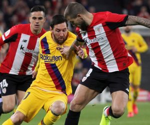 epa08198635 Athletic Club's defender Yeray (R) vies for the ball against FC Barcelona's forward Leo Messi (C) during the Spanish King's Cup quarters final between Athletic Bilbao and FC Barcelona at San Mames stadium in Bilbao, northern Spain, 06 February 2020.  EPA/MIGUEL TONA