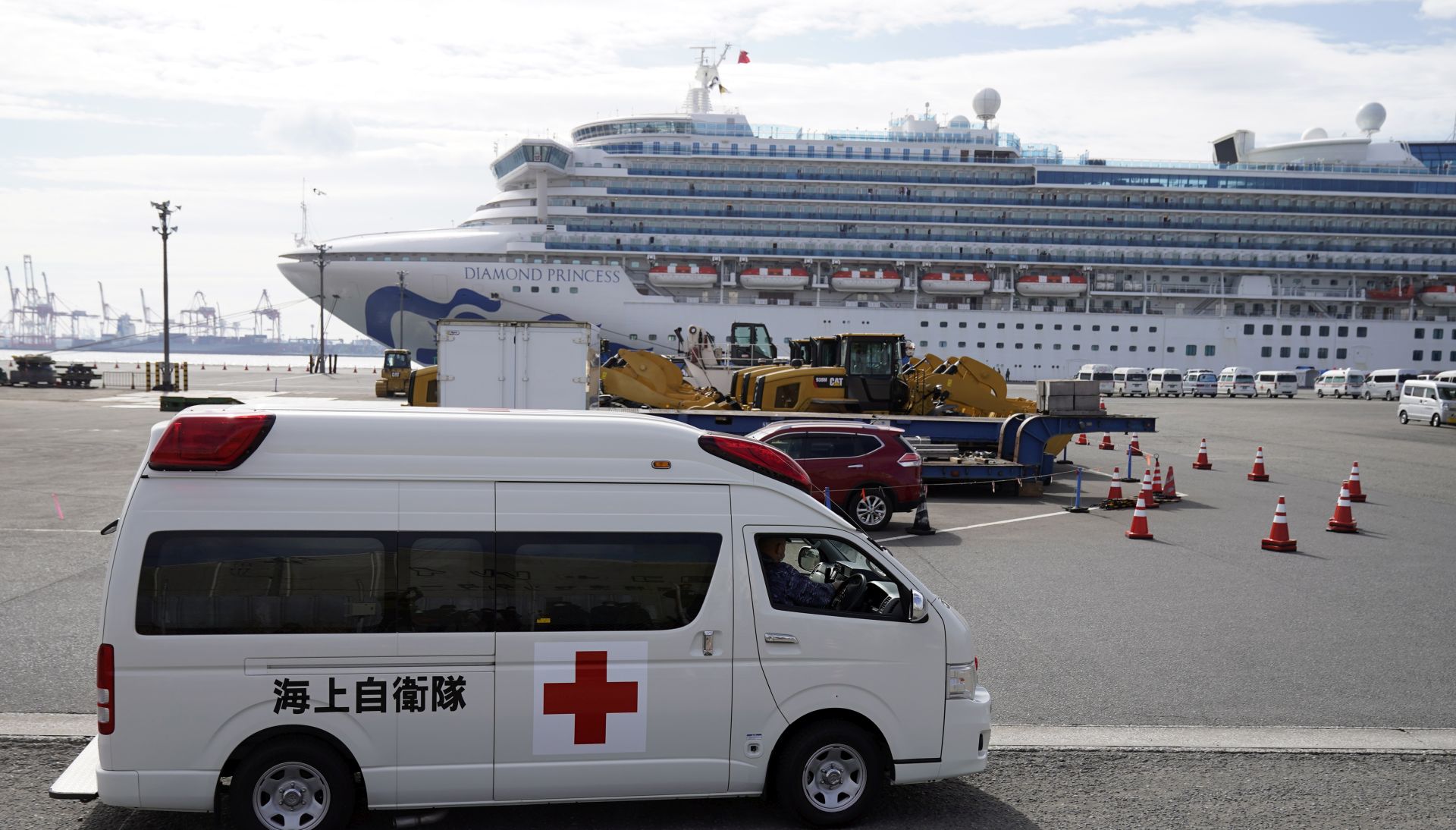 epa08212430 An ambulance arrives at the Daikoku Pier Cruise Terminal where the Diamond Princess cruise ship is docked in Yokohama, south of Tokyo, Japan, 12 February 2020. According to latest media reports, 174 passengers of the Diamond Princess cruise ship have been tested positive for the Covid-19, raising the number of infections to 203 in Japan. The disease caused by the novel coronavirus (SARS-CoV-2) has been officially named Covid-19 by the World Health Organization (WHO). The outbreak, which originated in the Chinese city of Wuhan, has so far killed at least 1,115 people and infected over 45,000 others worldwide, mostly in China.  EPA/FRANCK ROBICHON