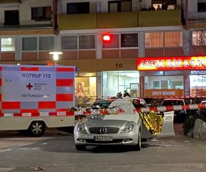epa08229341 An Ambulance at the crime scene after a shooting in Hanau near Frankfurt am Main, Germany, 20 February 2020. According to media reports at least eight people were killed in shootings in Hanau.  EPA/WIESBADEN112