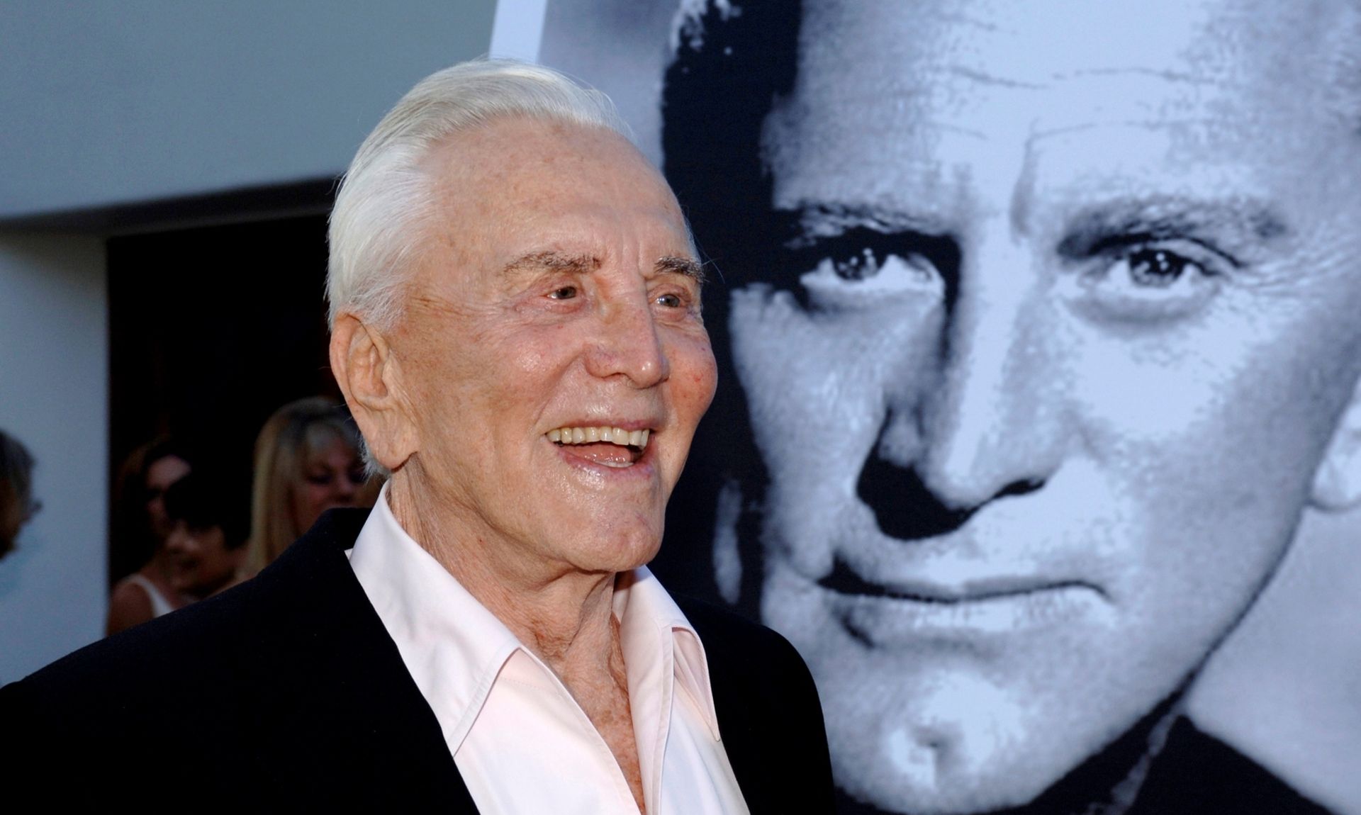 FILE PHOTO: Actor Douglas arrives to receive an inaugural award for Excellence in film presented by the Santa Barbara International Film Festival in Santa Barbara FILE PHOTO: Actor Kirk Douglas arrives to receive an inaugural award for Excellence in film presented by the Santa Barbara International Film Festival at a black-tie gala fundraiser in his honor at the Bacara Resort & Spa in Santa Barbara, California, July 30, 2006. REUTERS/Phil Klein/File Photo Phil Klein